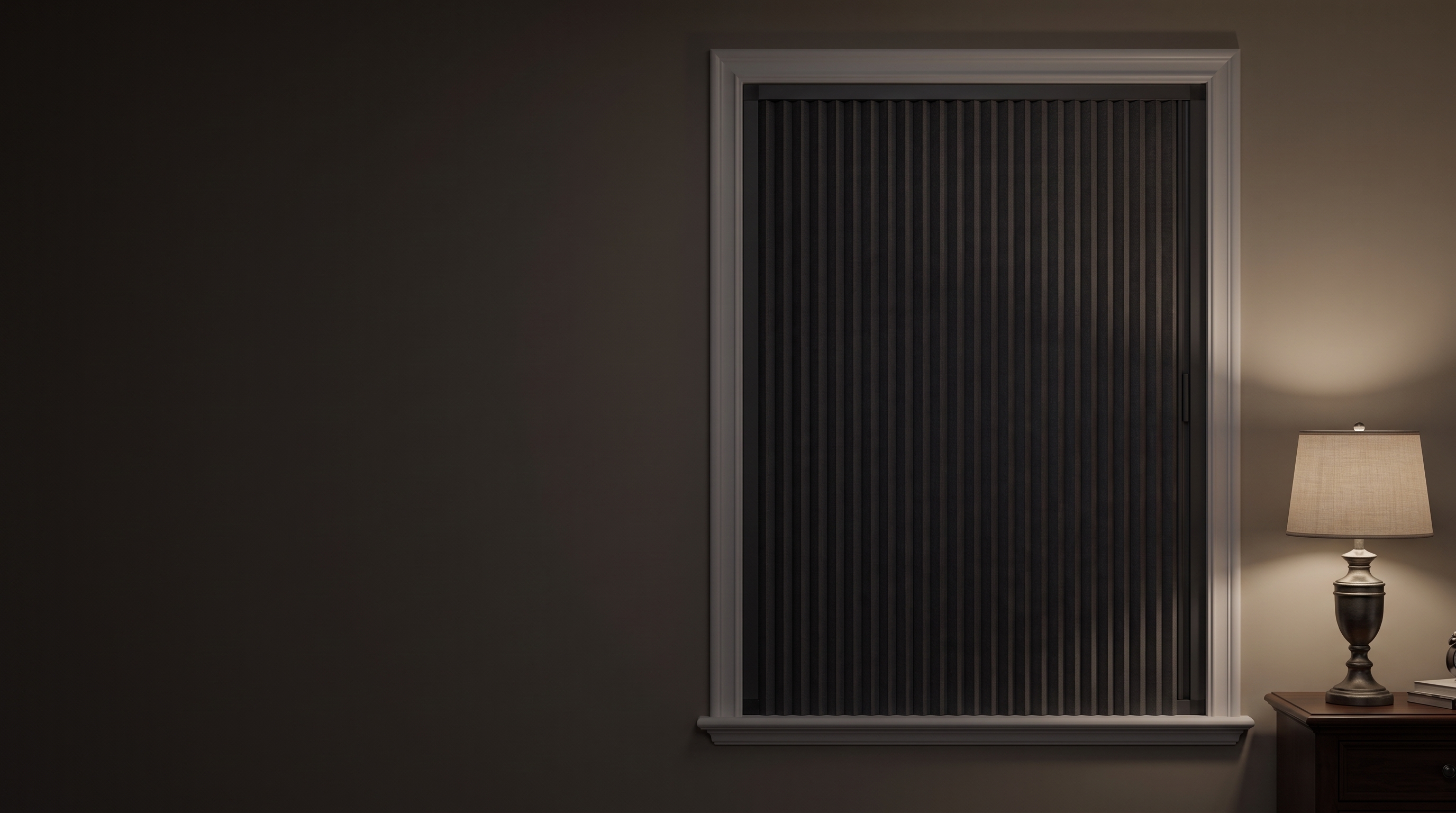 Dark bedroom with the blackout blind fully closed